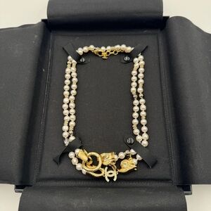 CHANEL Gold and White Pearl Necklace